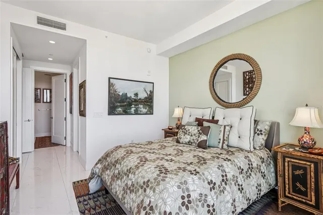 a bathroom with a double vanity sink mirror and double