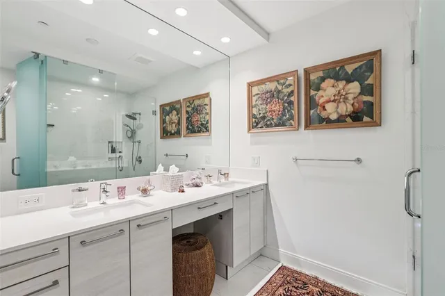 a living room with furniture tv and a floor to ceiling window