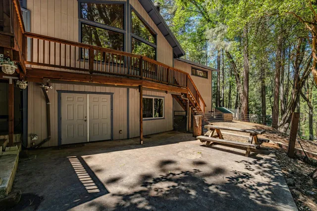 a backyard of a house with lots of green space