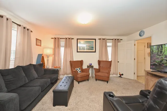 a living room with furniture and a couch