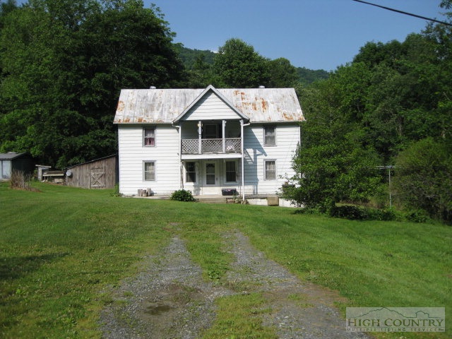 1535 Dark Ridge Road Elk Park, NC 28622 - Photo 1 of 8 a aerial view of a house with a yard