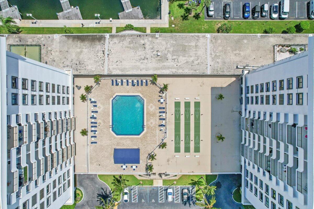 1200 Marine Way, Unit 304 North Palm Beach, FL 33408 - Photo 28 of 31 a view of a house with a yard and plants