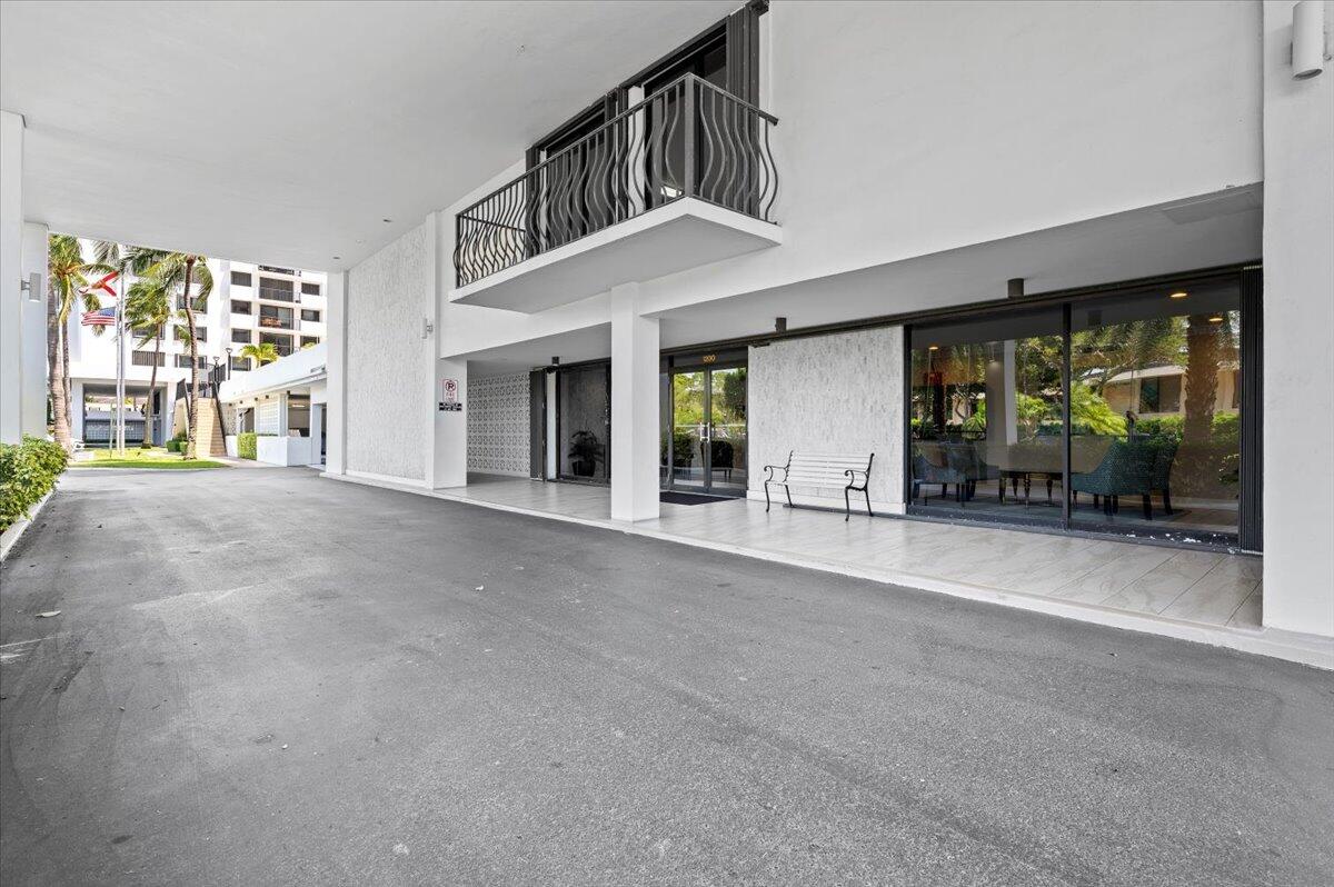 1200 Marine Way, Unit 304 North Palm Beach, FL 33408 - Photo 3 of 31 a view of a building with a porch