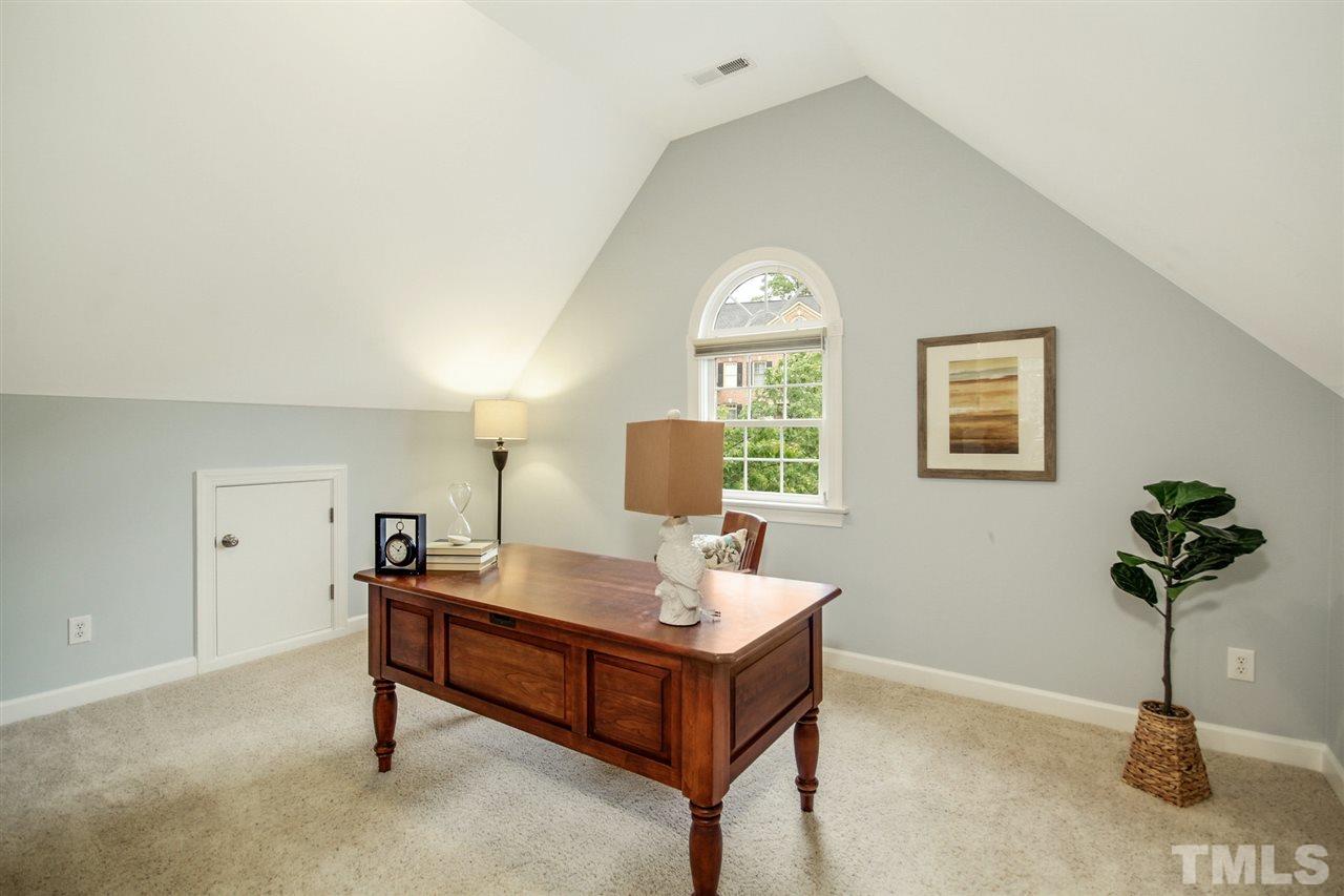 2109 CRIGAN Bluff Drive Cary, NC 27513 - Photo 16 of 30 a living room with furniture and a potted plant