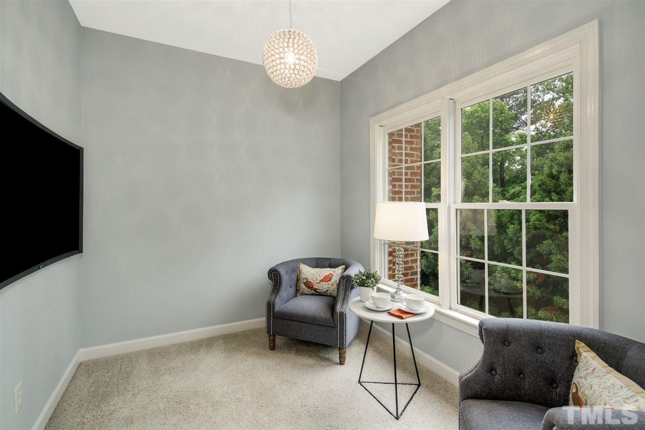 2109 CRIGAN Bluff Drive Cary, NC 27513 - Photo 17 of 30 a living room with furniture and a flat screen tv