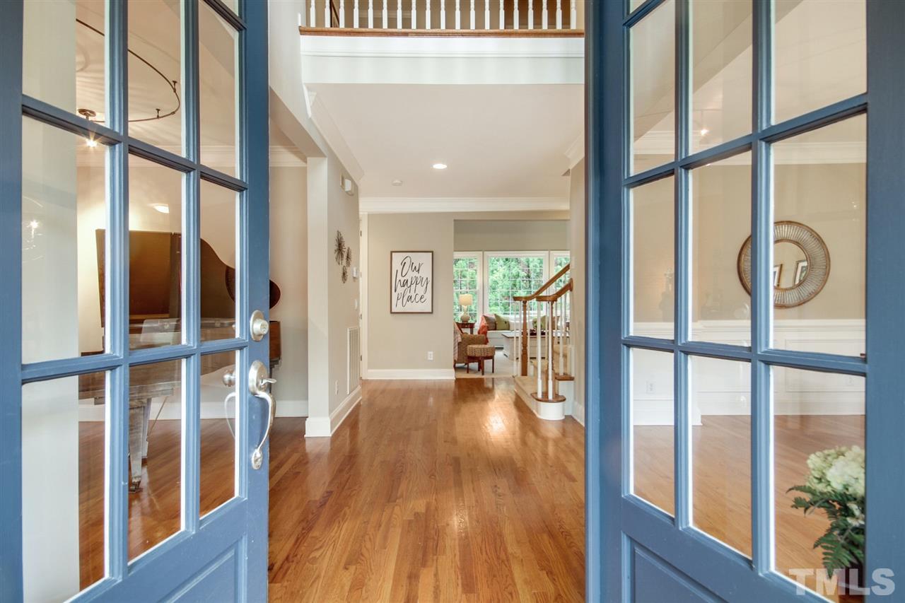 2109 CRIGAN Bluff Drive Cary, NC 27513 - Photo 3 of 30 a view of an entryway with wooden floor