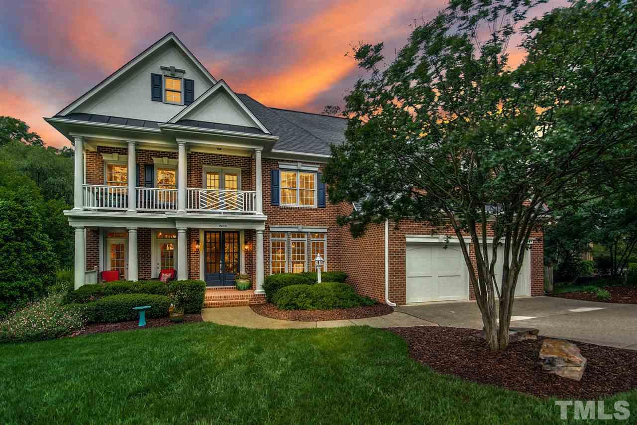 2109 CRIGAN Bluff Drive Cary, NC 27513 - Photo 30 of 30 a front view of a house with a yard