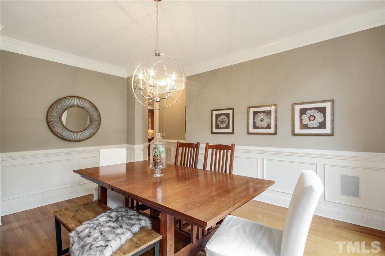2109 CRIGAN Bluff Drive Cary, NC 27513 - Photo 5 of 30 a view of a dining room with furniture and chandelier