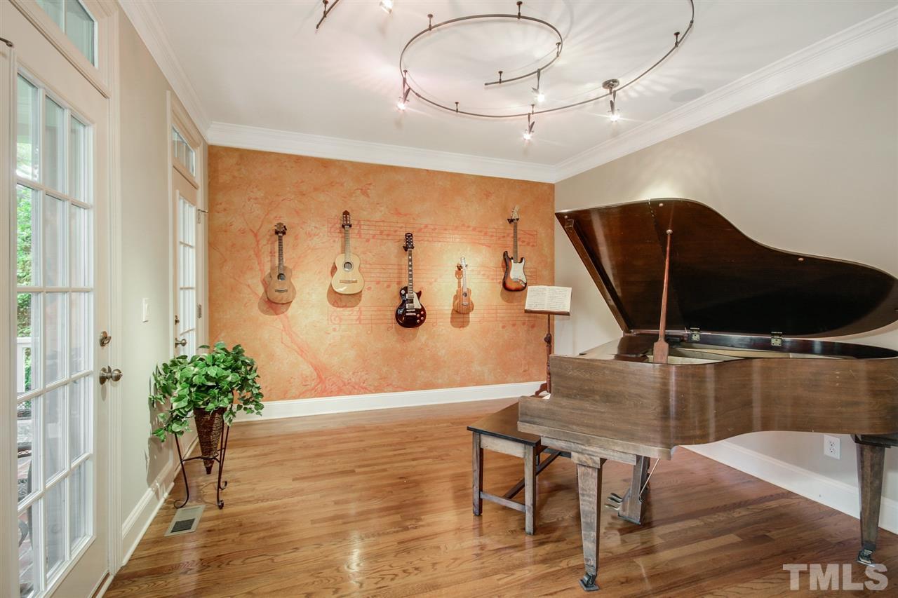 2109 CRIGAN Bluff Drive Cary, NC 27513 - Photo 6 of 30 a living room with furniture