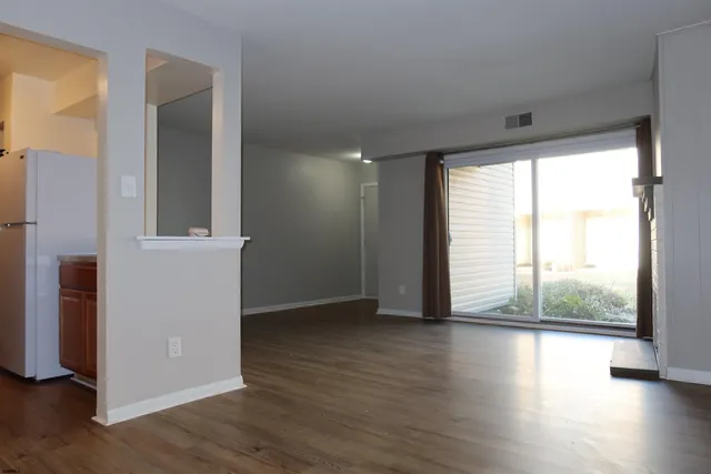 a kitchen with a sink cabinets and stainless steel appliances
