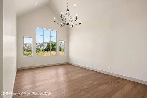 a utility room with cabinets washer and dryer