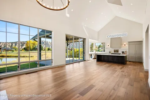 a view of a living room and dining room