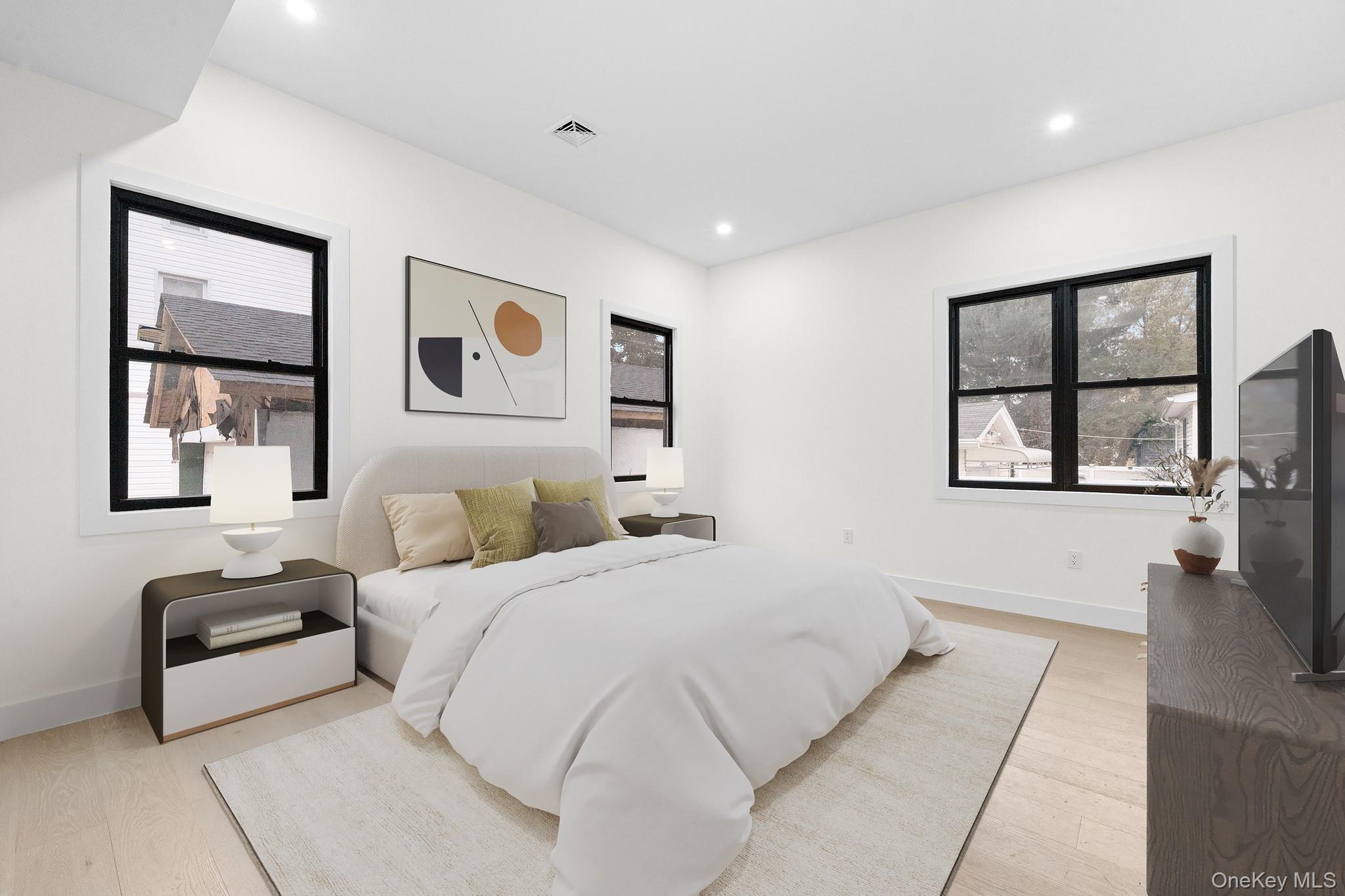 116-20 194th Street Queens, NY 11412 - Photo 9 of 27 Bedroom featuring light wood-style flooring and recessed lighting