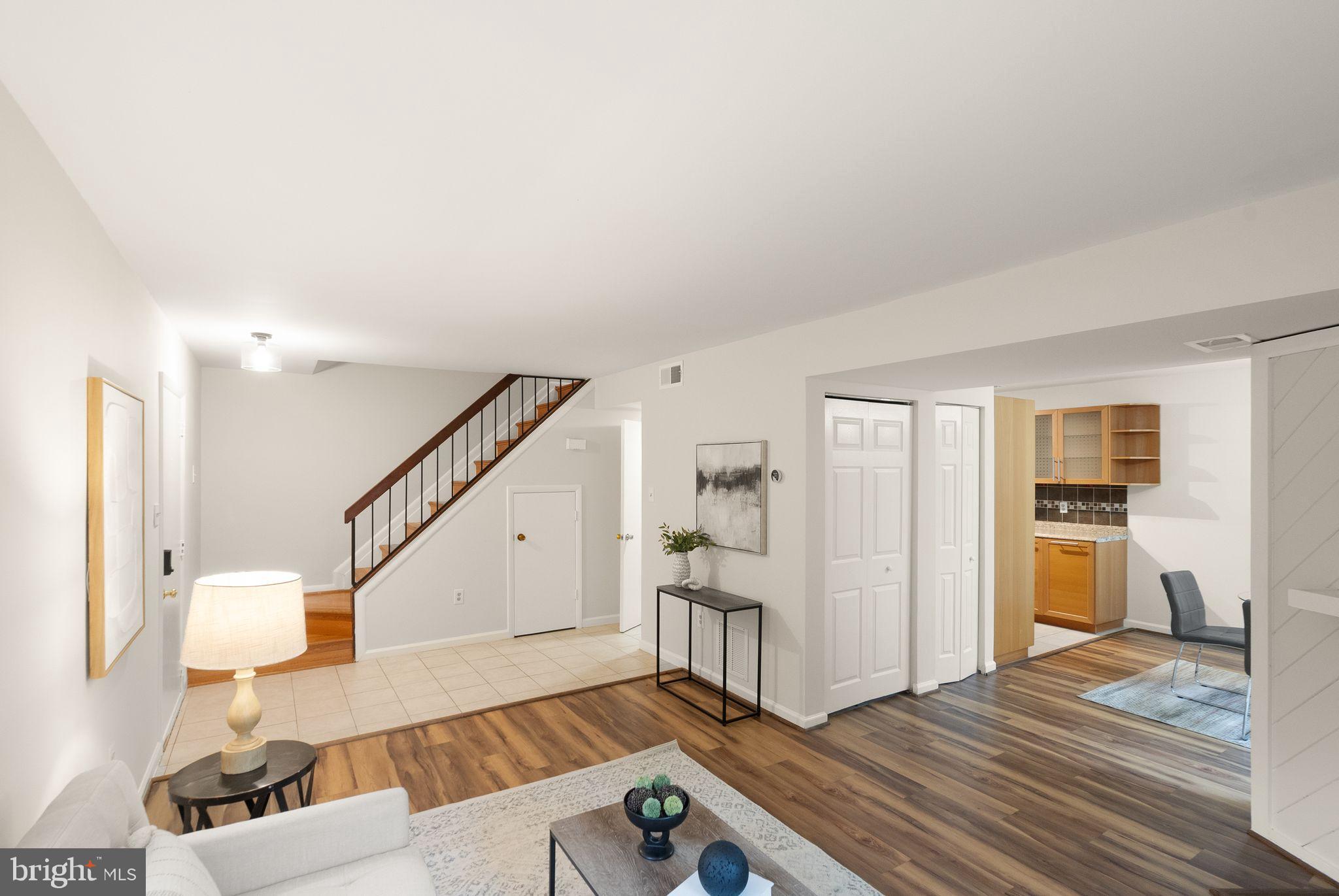 10679 Spring Oak Court Burke, VA 22015 - Photo 12 of 42 a living room with furniture and wooden floor