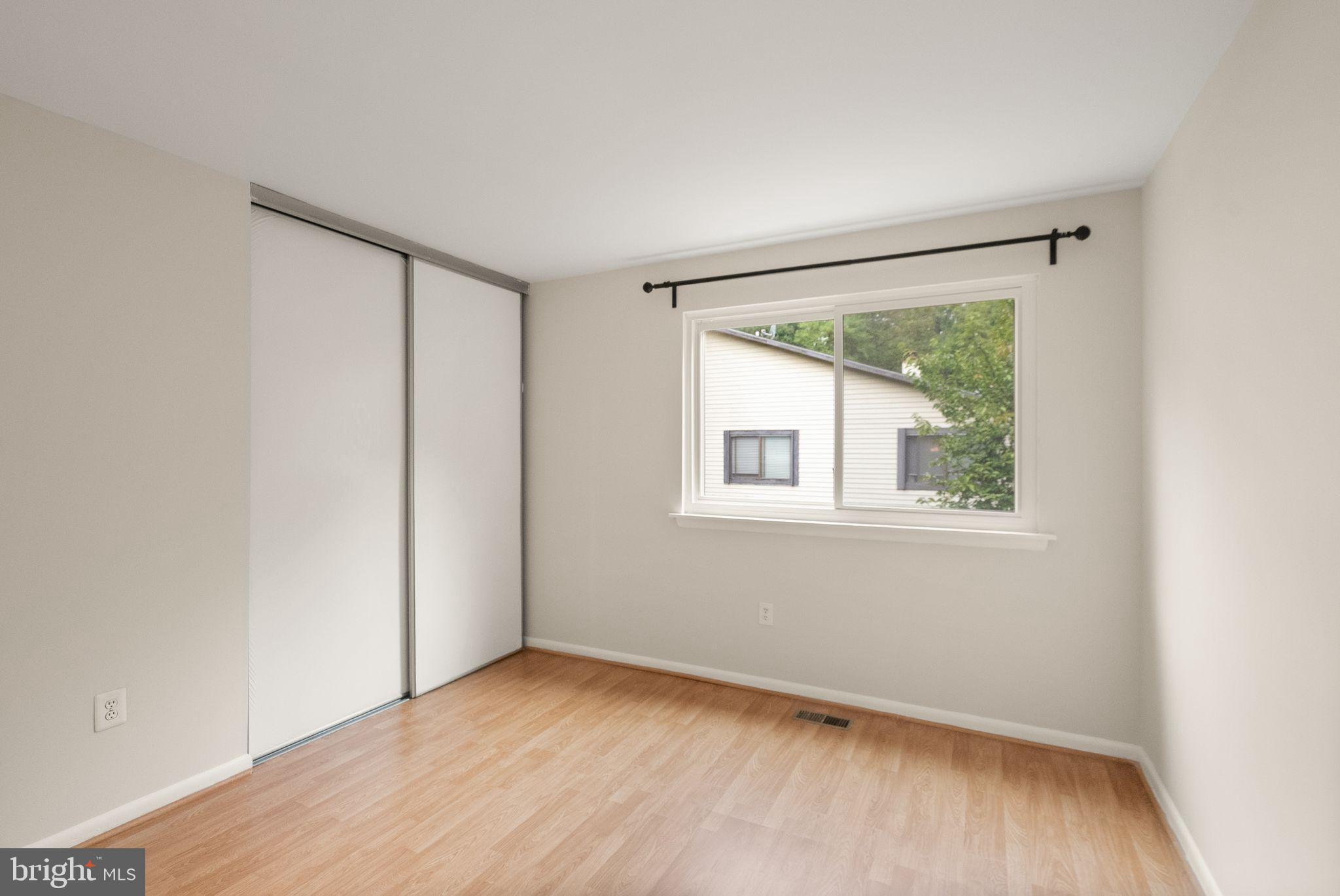 10679 Spring Oak Court Burke, VA 22015 - Photo 31 of 42 an empty room with a window