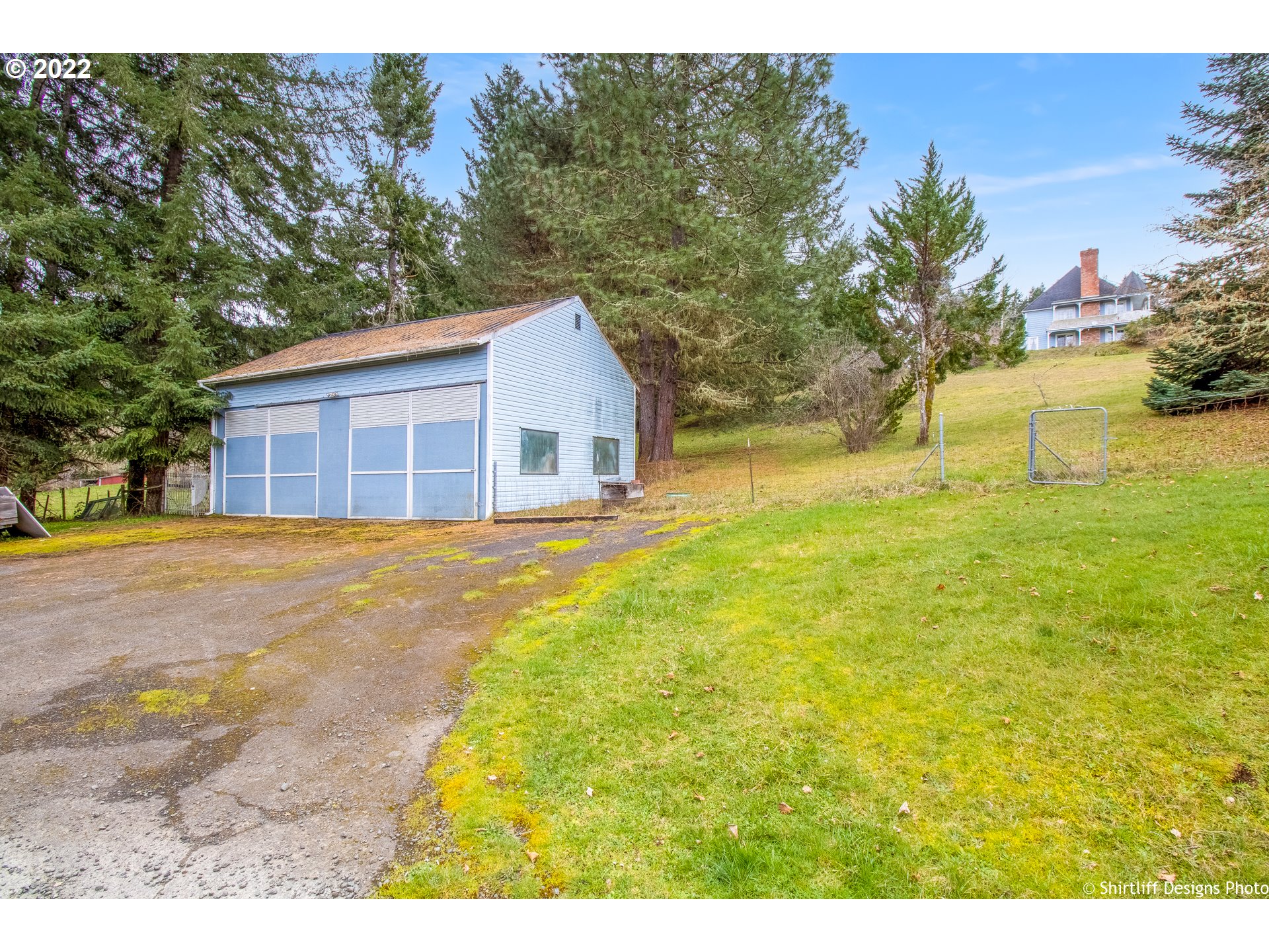 32482 Doolittle Road Cottage Grove, OR 97424 - Photo 30 of 32 a view of a house with a yard