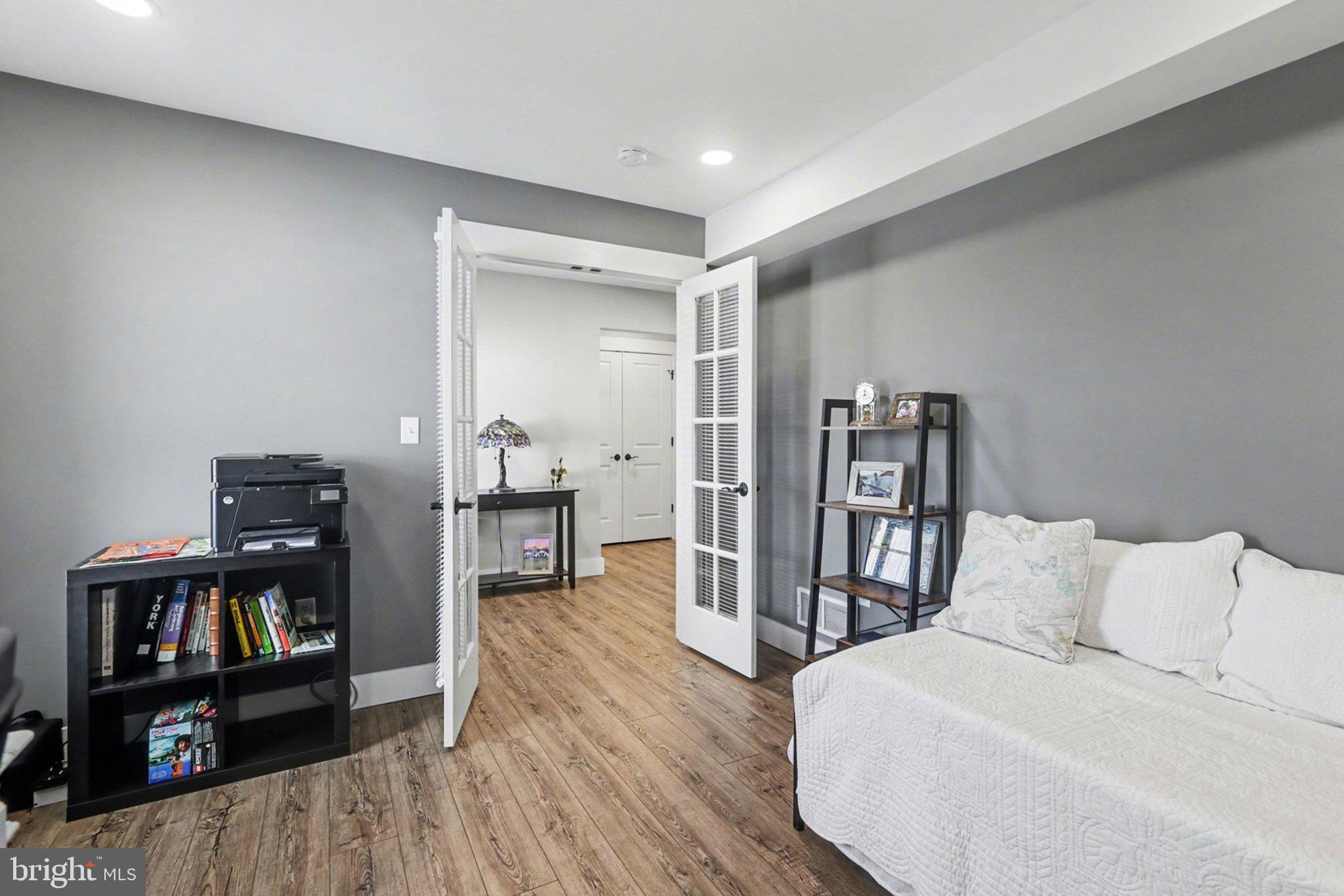 545 Pleasant View Road Lewisberry, PA 17339 - Photo 16 of 62 a spacious bedroom with a bed and a book shelf