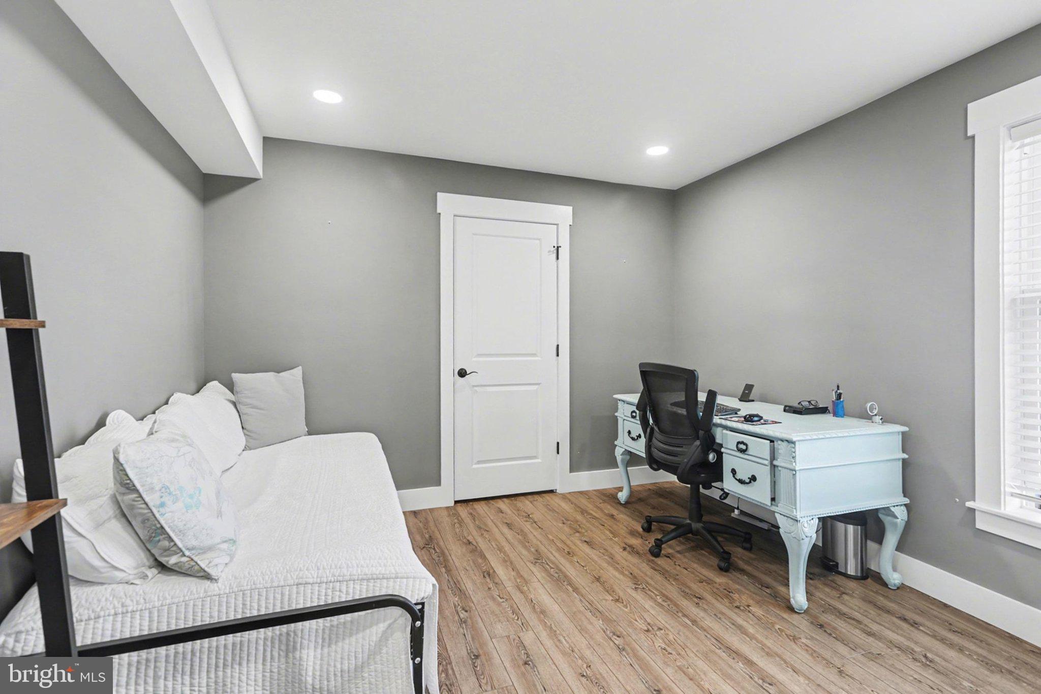 545 Pleasant View Road Lewisberry, PA 17339 - Photo 17 of 62 a workspace with furniture and wooden floor