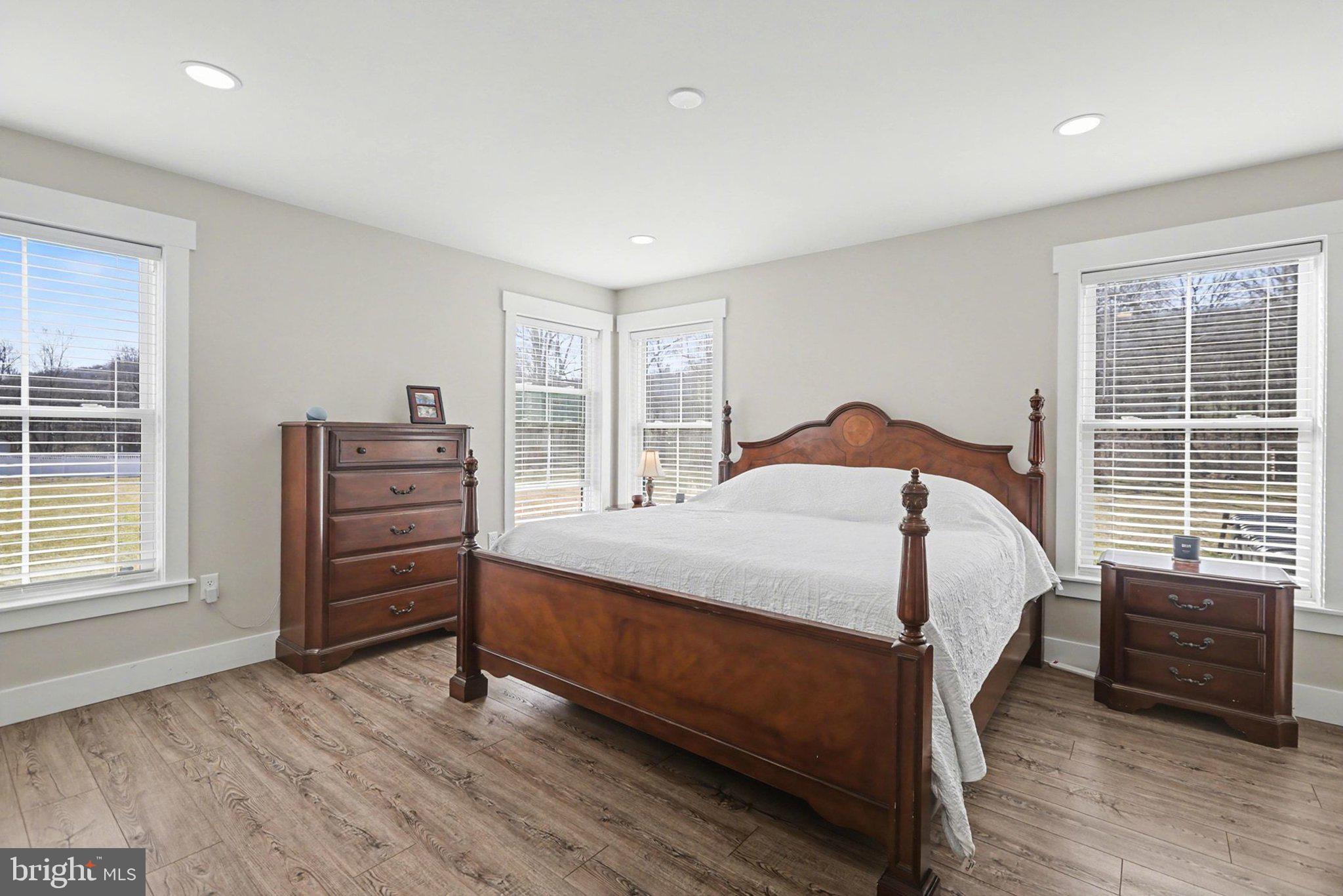 545 Pleasant View Road Lewisberry, PA 17339 - Photo 19 of 62 a bedroom with a bed closet and a window