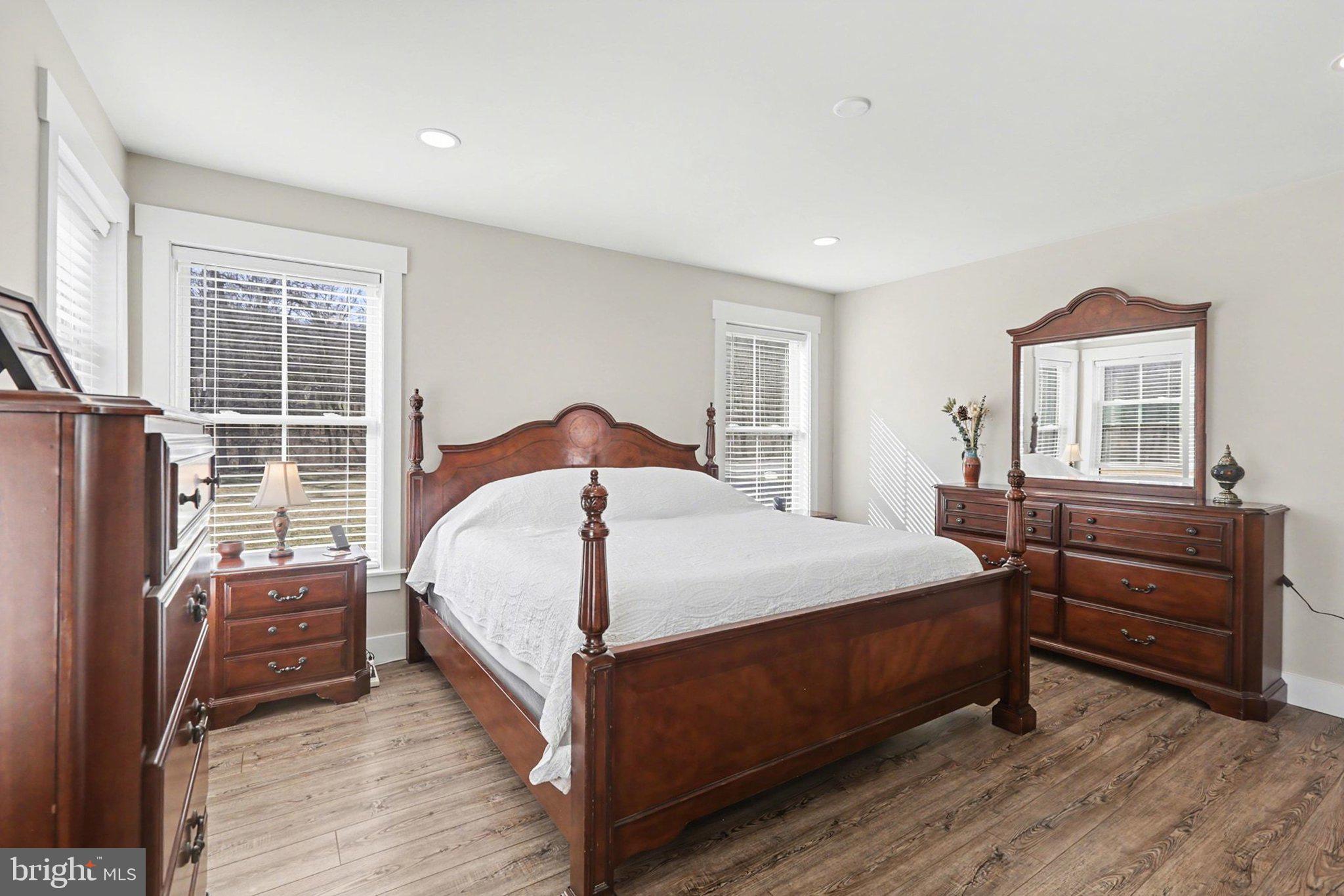 545 Pleasant View Road Lewisberry, PA 17339 - Photo 21 of 62 a bedroom with a bed next to a window with a dresser