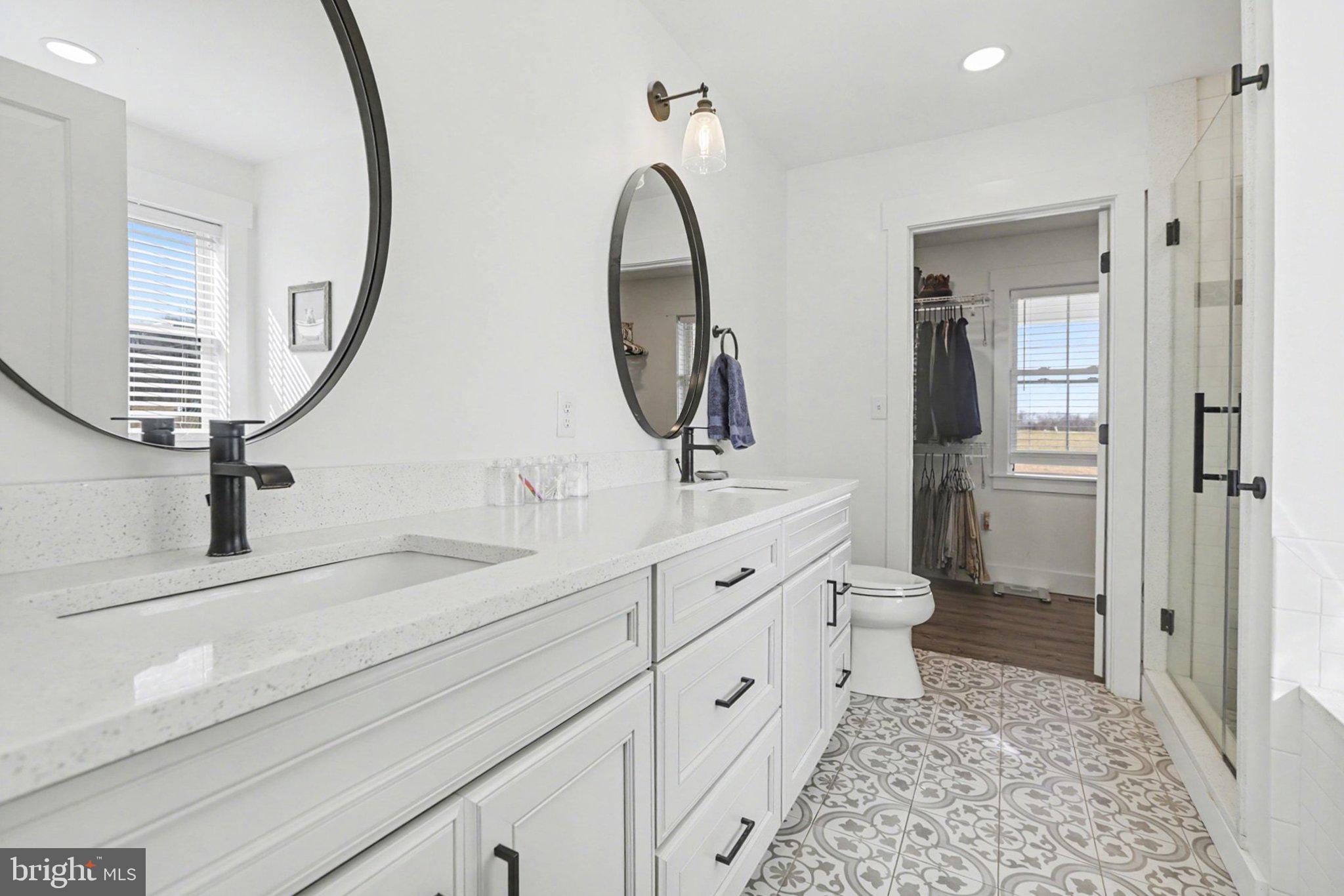 545 Pleasant View Road Lewisberry, PA 17339 - Photo 22 of 62 a bathroom with double vanity sink and a mirror