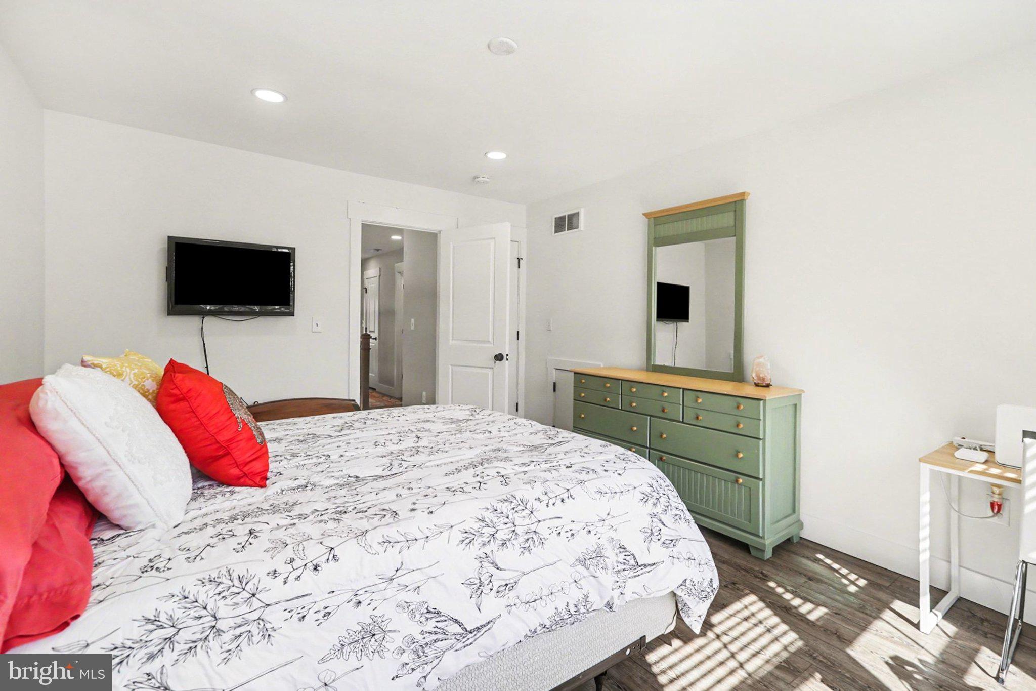 545 Pleasant View Road Lewisberry, PA 17339 - Photo 27 of 62 a bedroom with a bed and a flat screen tv