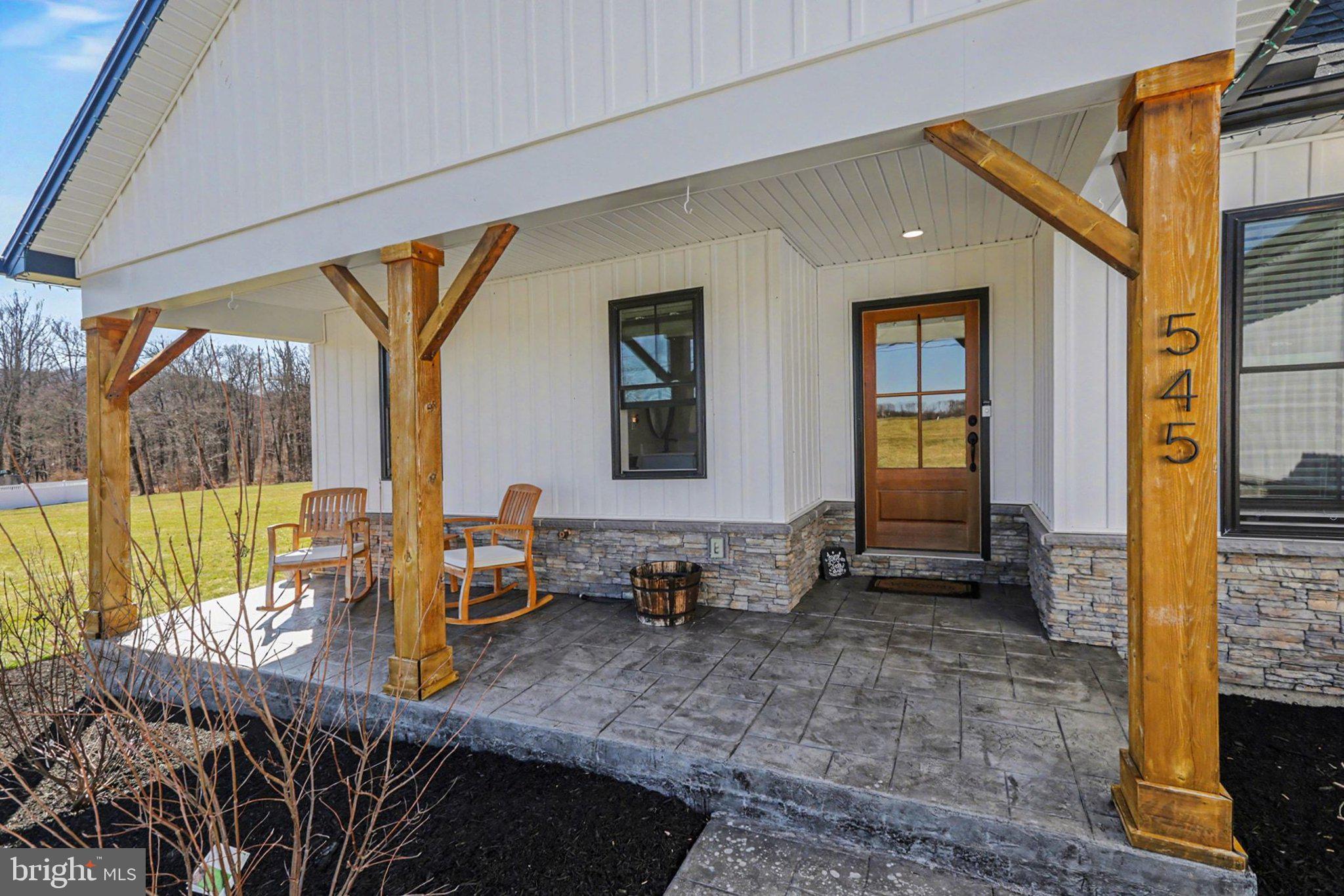 545 Pleasant View Road Lewisberry, PA 17339 - Photo 3 of 62 a dining room with furniture and a floor to ceiling window