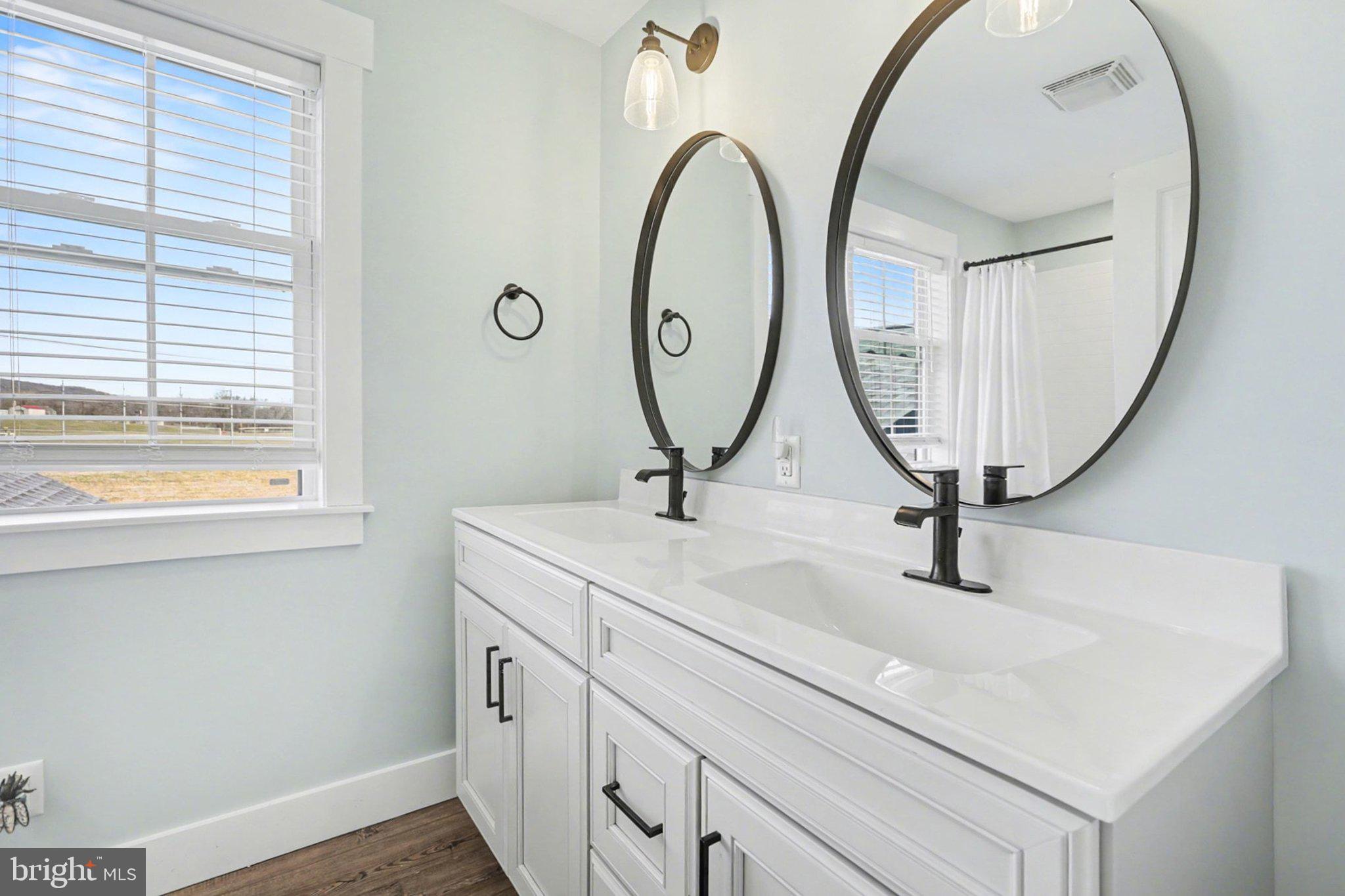 545 Pleasant View Road Lewisberry, PA 17339 - Photo 31 of 62 a bathroom with a sink and a mirror