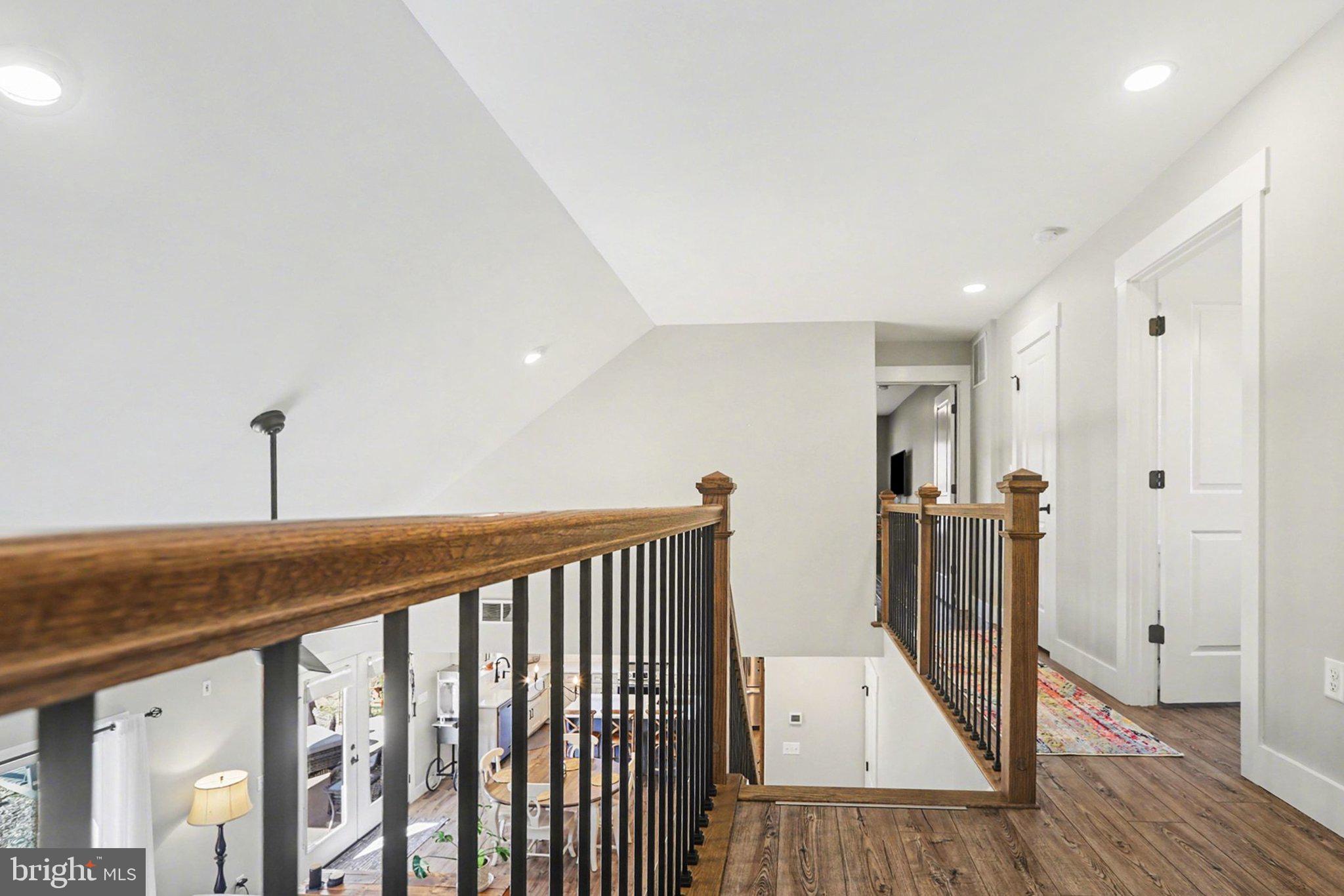 545 Pleasant View Road Lewisberry, PA 17339 - Photo 35 of 62 a view of a hallway with wooden floor and staircase