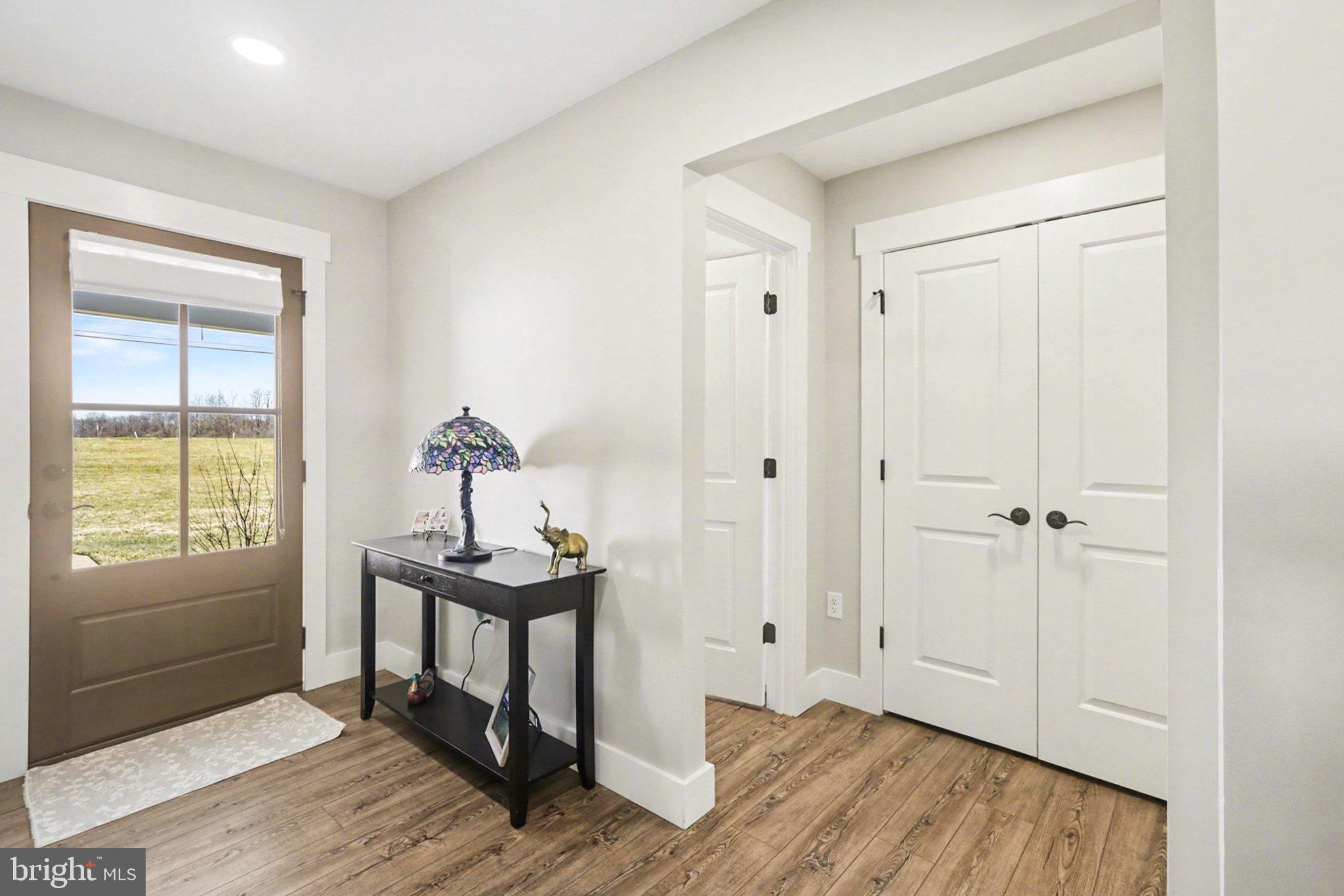 545 Pleasant View Road Lewisberry, PA 17339 - Photo 4 of 62 a very nice looking room with a window and wooden floor
