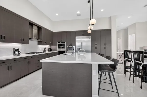a bathroom with a tub and a sink