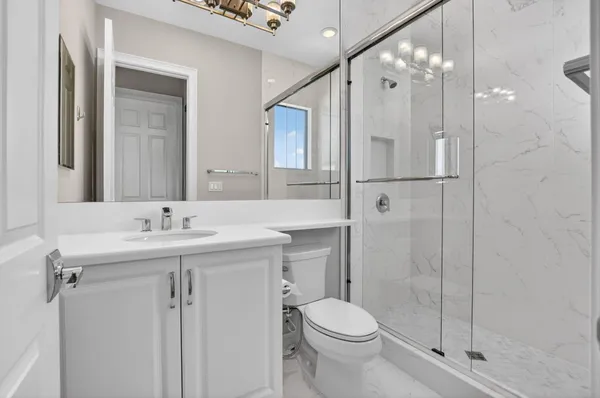 a view of a house with a yard and a garden