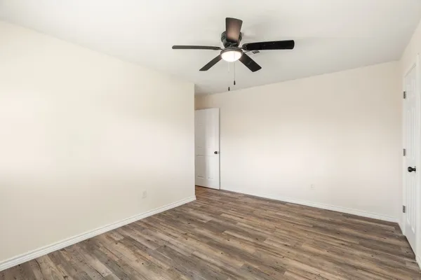 a view of a big room with wooden floor