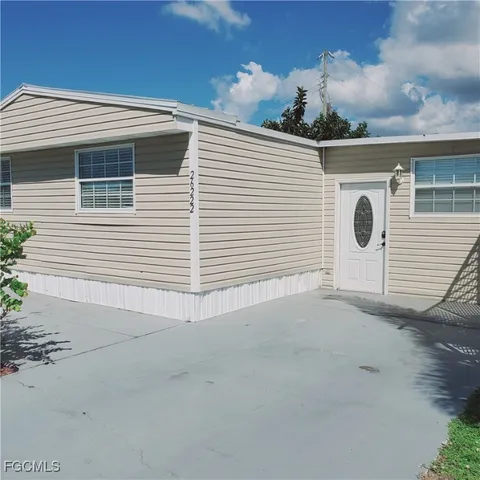 a view of a house with a garage