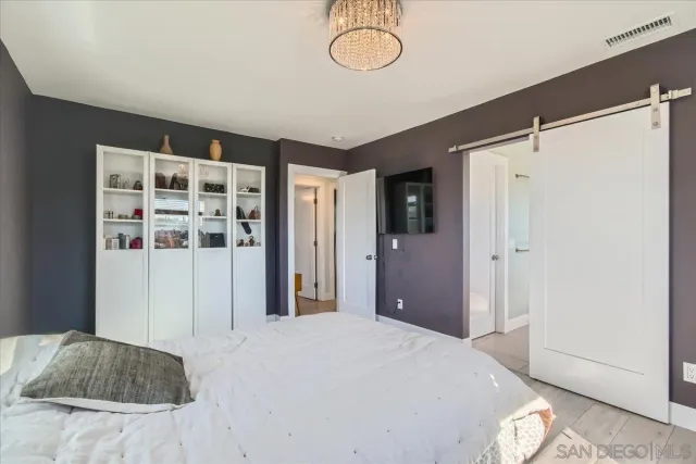 a bathroom with a tub and a shower