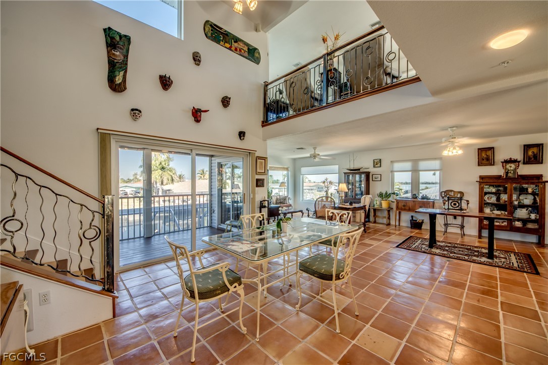 2702 Bruce Street Matlacha, FL 33993 - Photo 11 of 50 a living room with lots of furniture and lots of windows