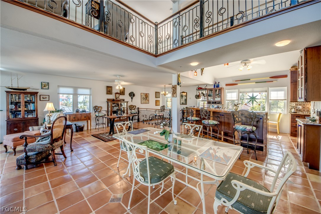 2702 Bruce Street Matlacha, FL 33993 - Photo 12 of 50 a room with lots of table and chairs