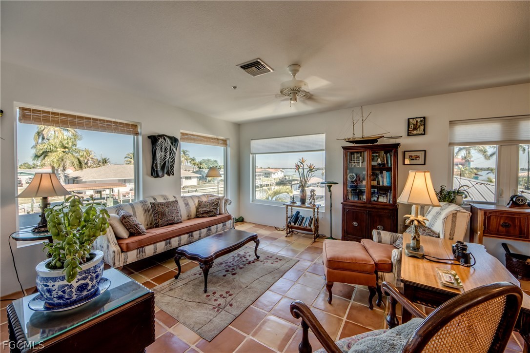 2702 Bruce Street Matlacha, FL 33993 - Photo 14 of 50 a living room with furniture and a large window