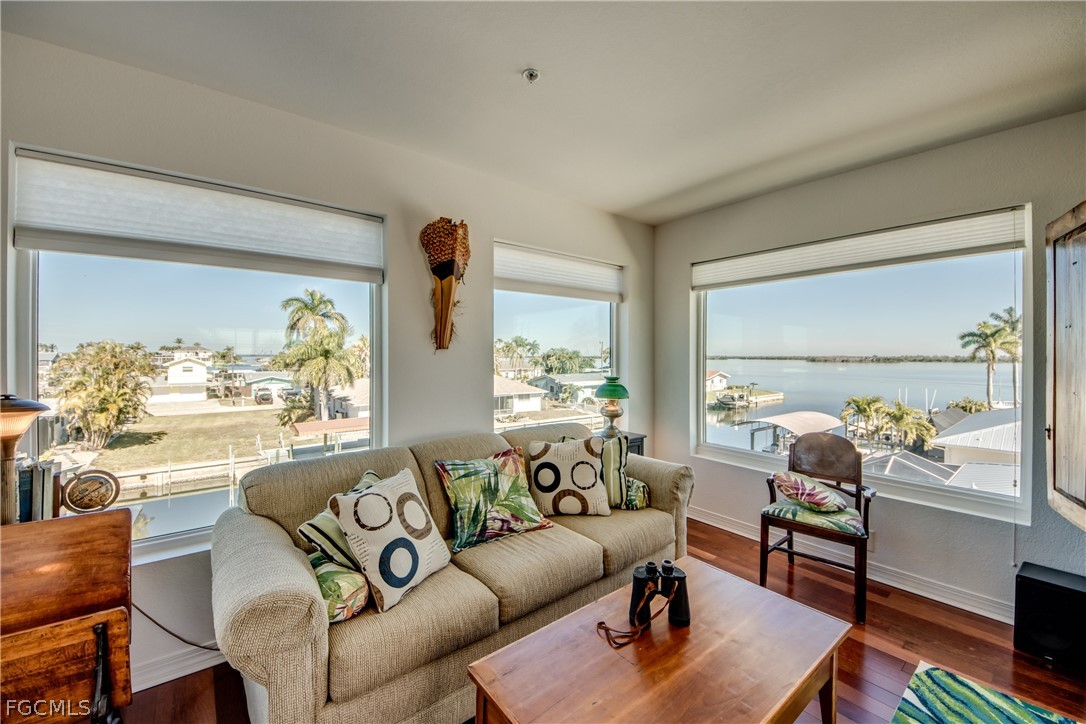 2702 Bruce Street Matlacha, FL 33993 - Photo 36 of 50 a living room with furniture and a large window