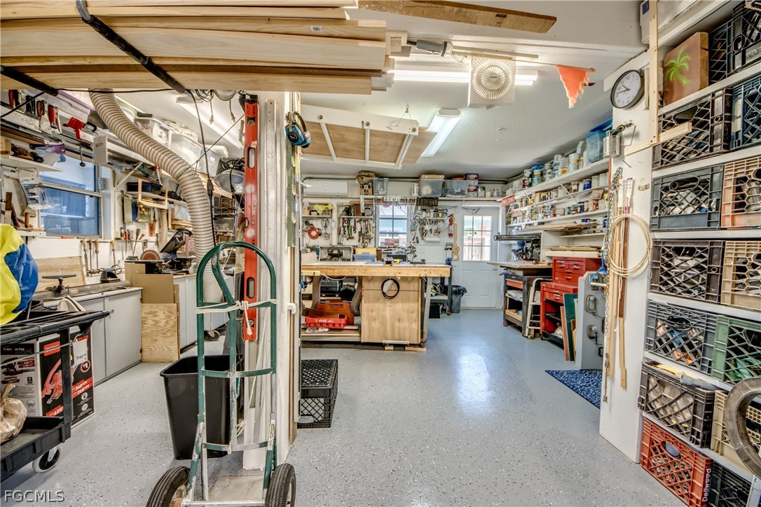 2702 Bruce Street Matlacha, FL 33993 - Photo 40 of 50 a view of a storage room with a refrigerator