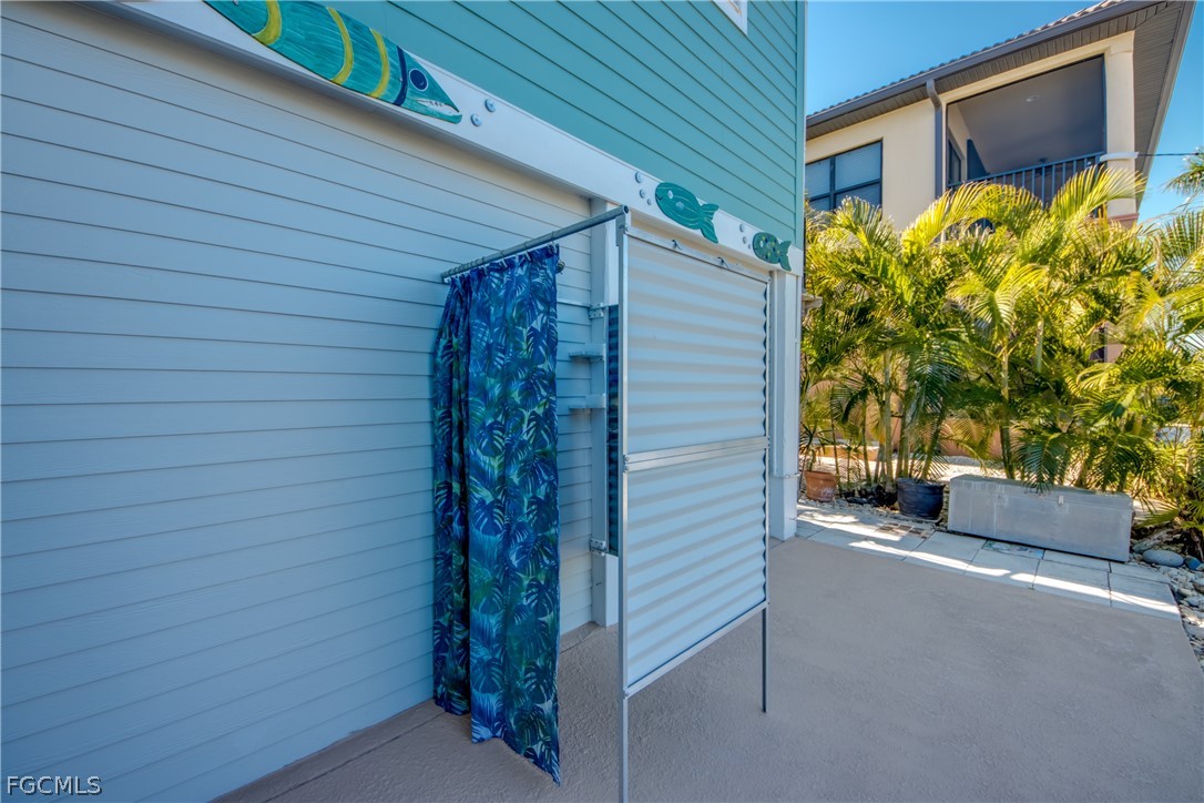 2702 Bruce Street Matlacha, FL 33993 - Photo 46 of 50 a view of a house with a garage