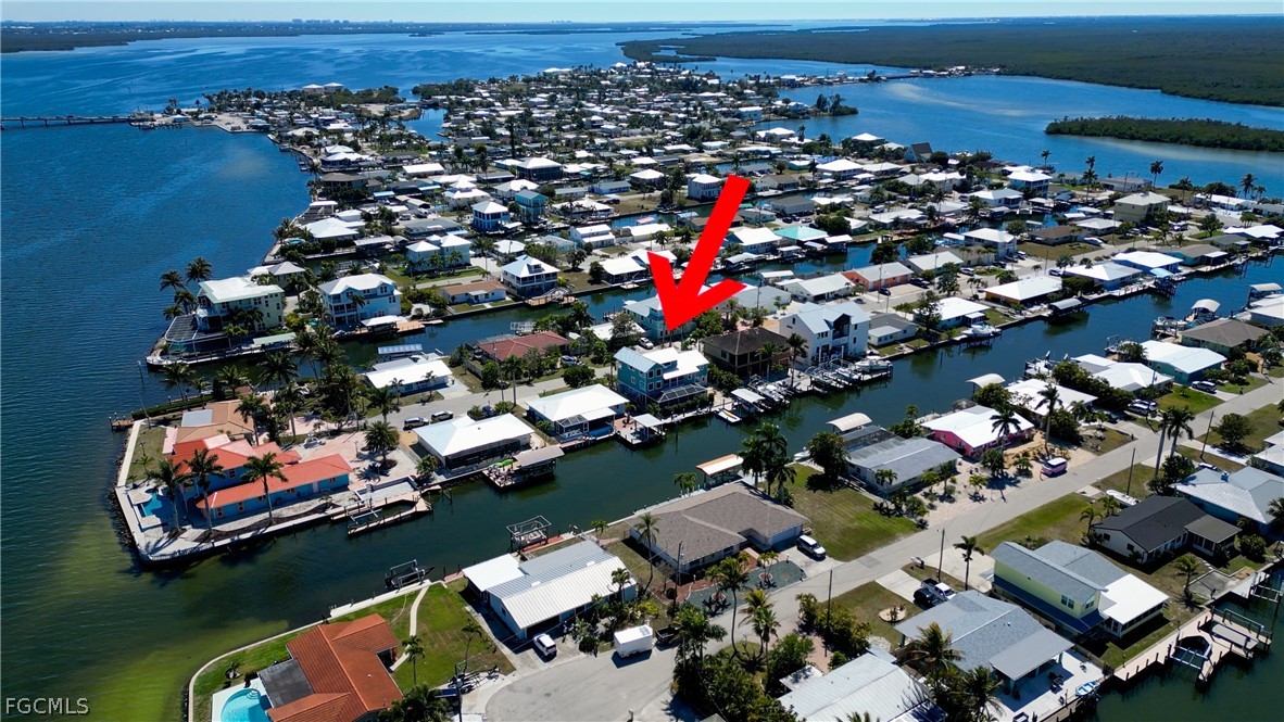 2702 Bruce Street Matlacha, FL 33993 - Photo 5 of 50 an aerial view of a houses with yard