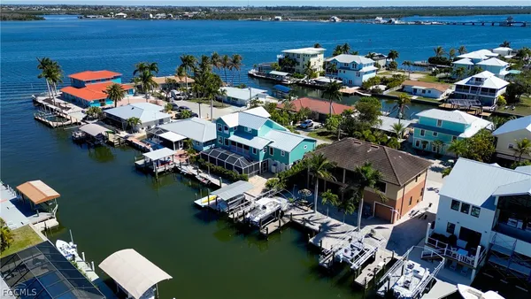 an aerial view of a houses with outdoor space