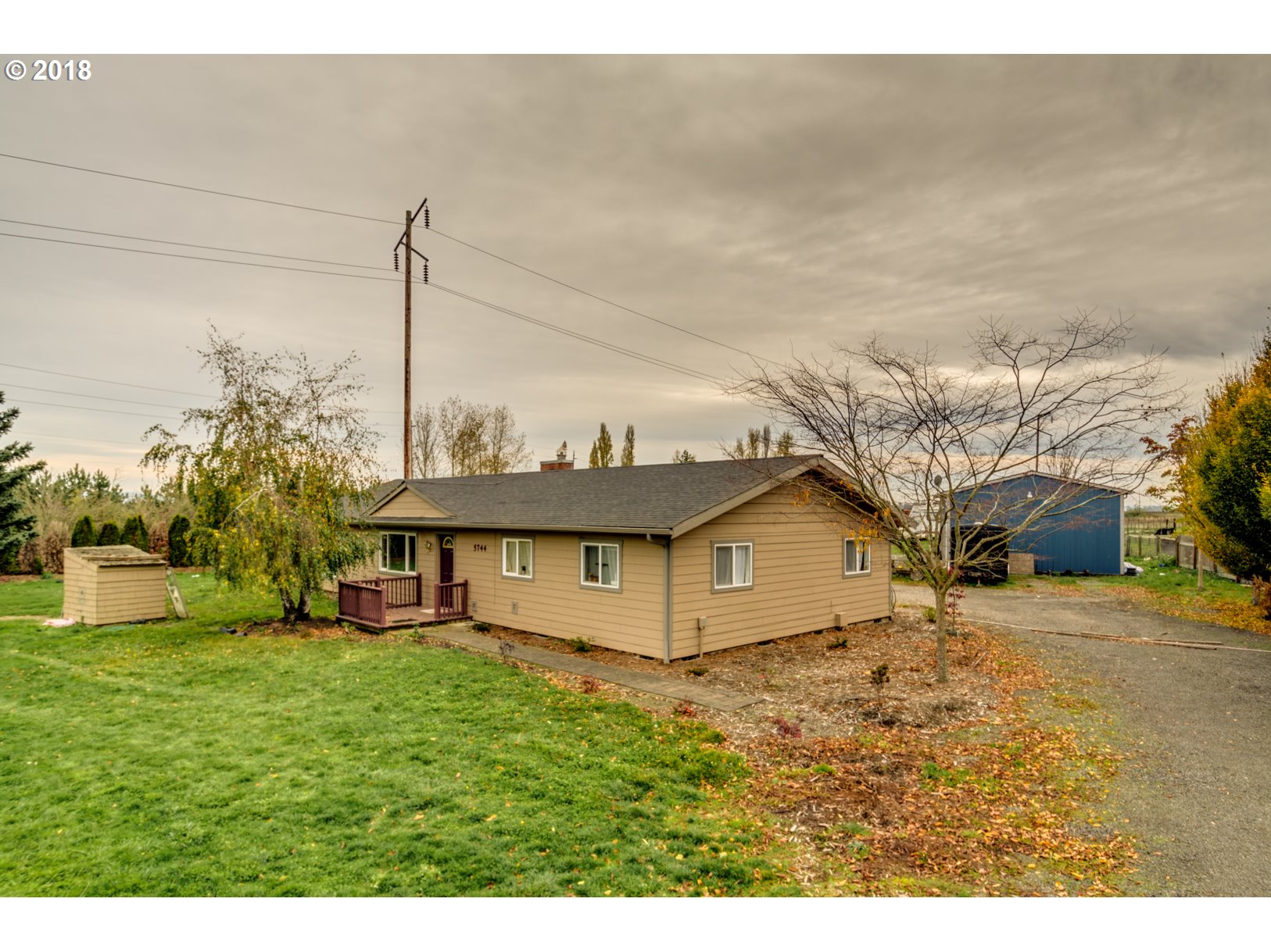 5744 Keene Road Northeast Gervais, OR 97026 - Photo 1 of 32 a house view with a garden space