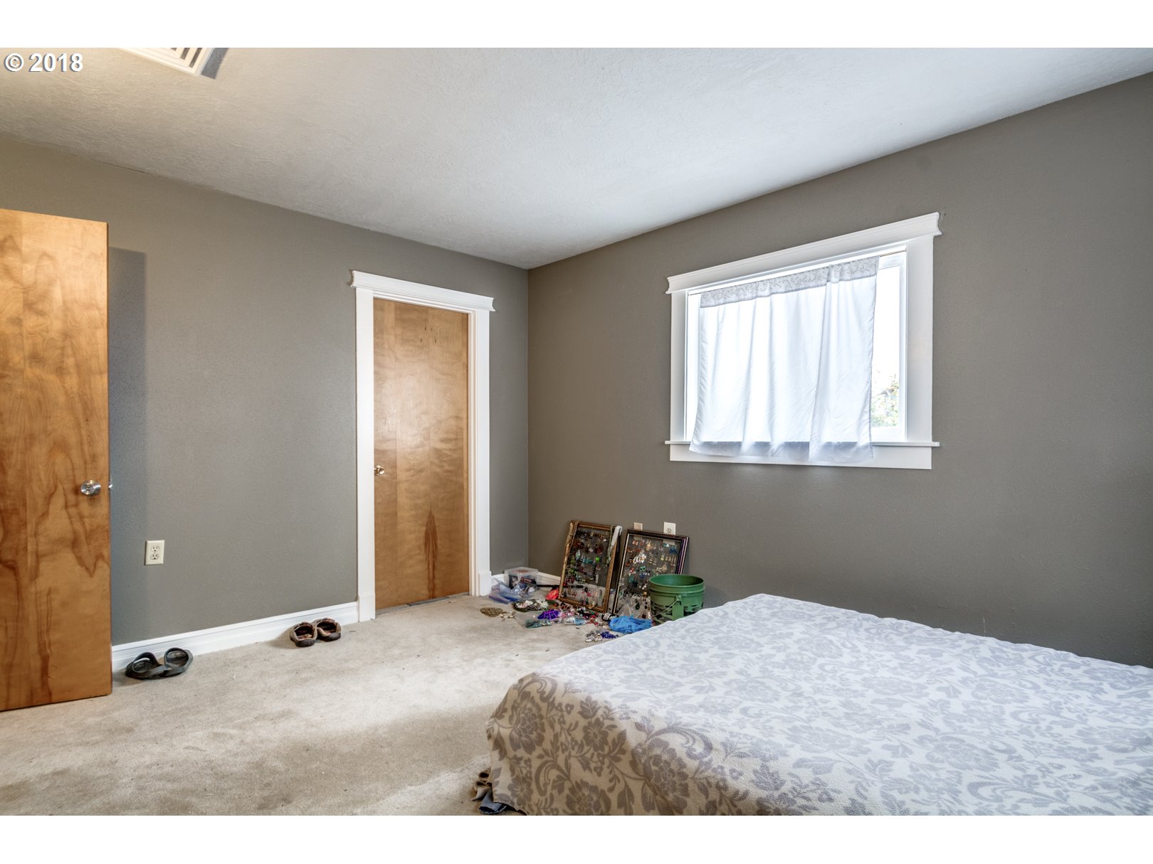 5744 Keene Road Northeast Gervais, OR 97026 - Photo 28 of 32 a bedroom with a bed and a window