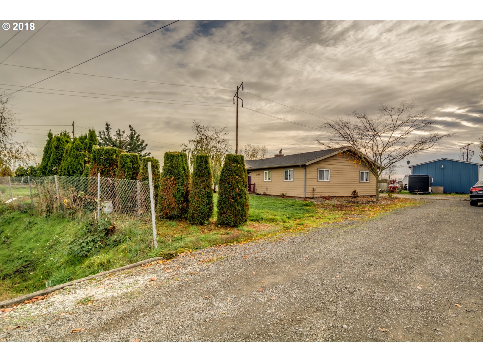 5744 Keene Road Northeast Gervais, OR 97026 - Photo 5 of 32 a house view with a outdoor space
