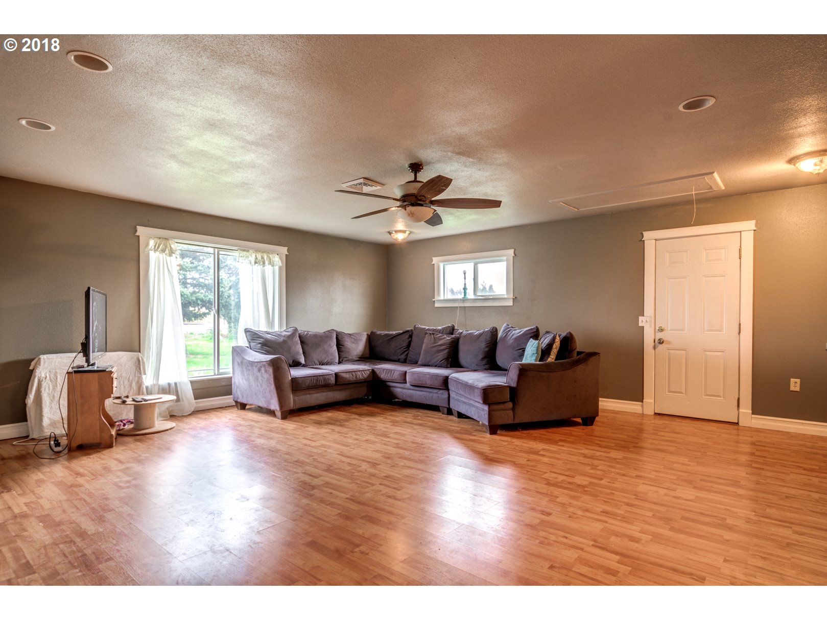 5744 Keene Road Northeast Gervais, OR 97026 - Photo 7 of 32 a living room with furniture and a large window