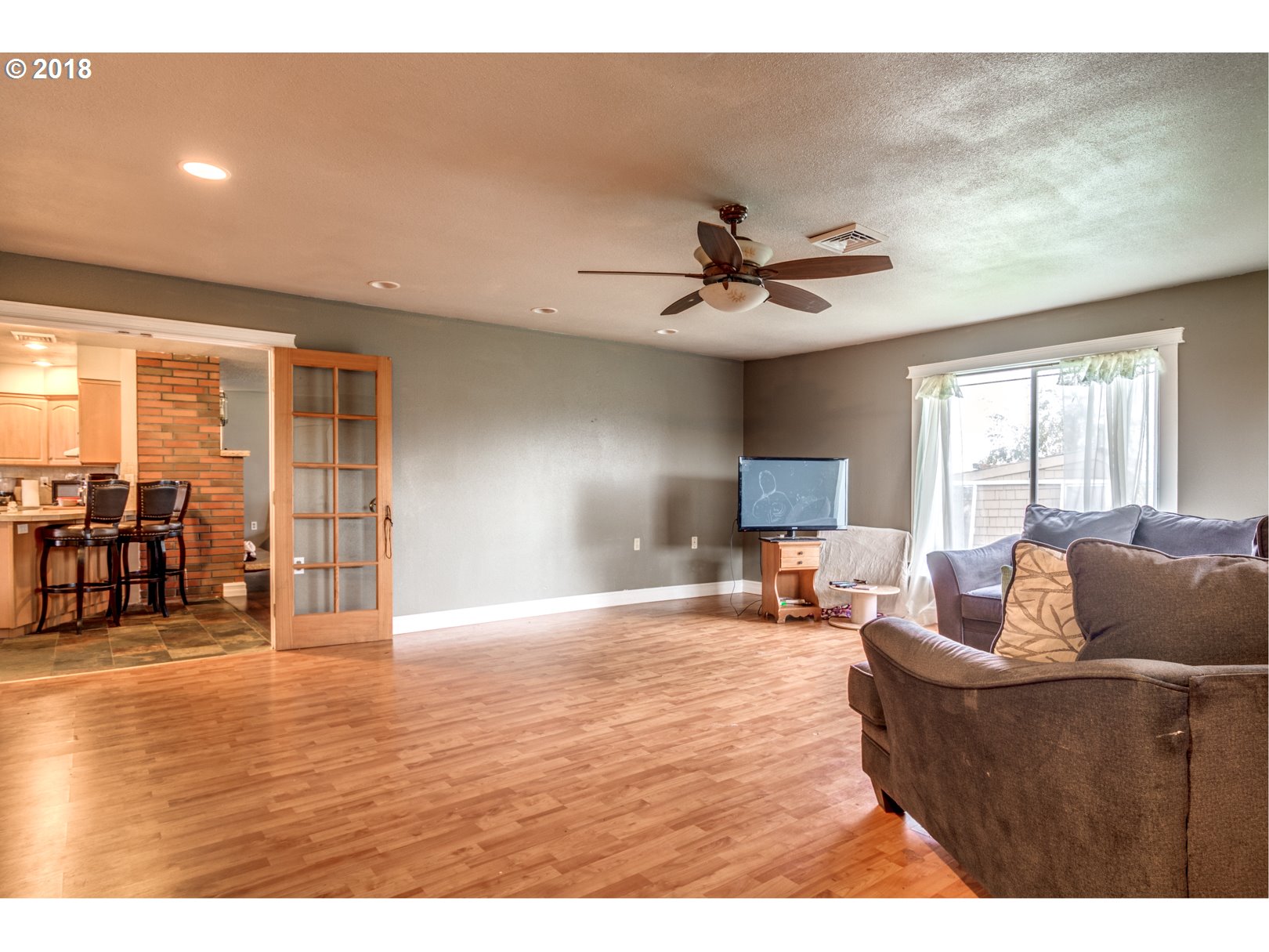 5744 Keene Road Northeast Gervais, OR 97026 - Photo 9 of 32 a living room with furniture and a large window
