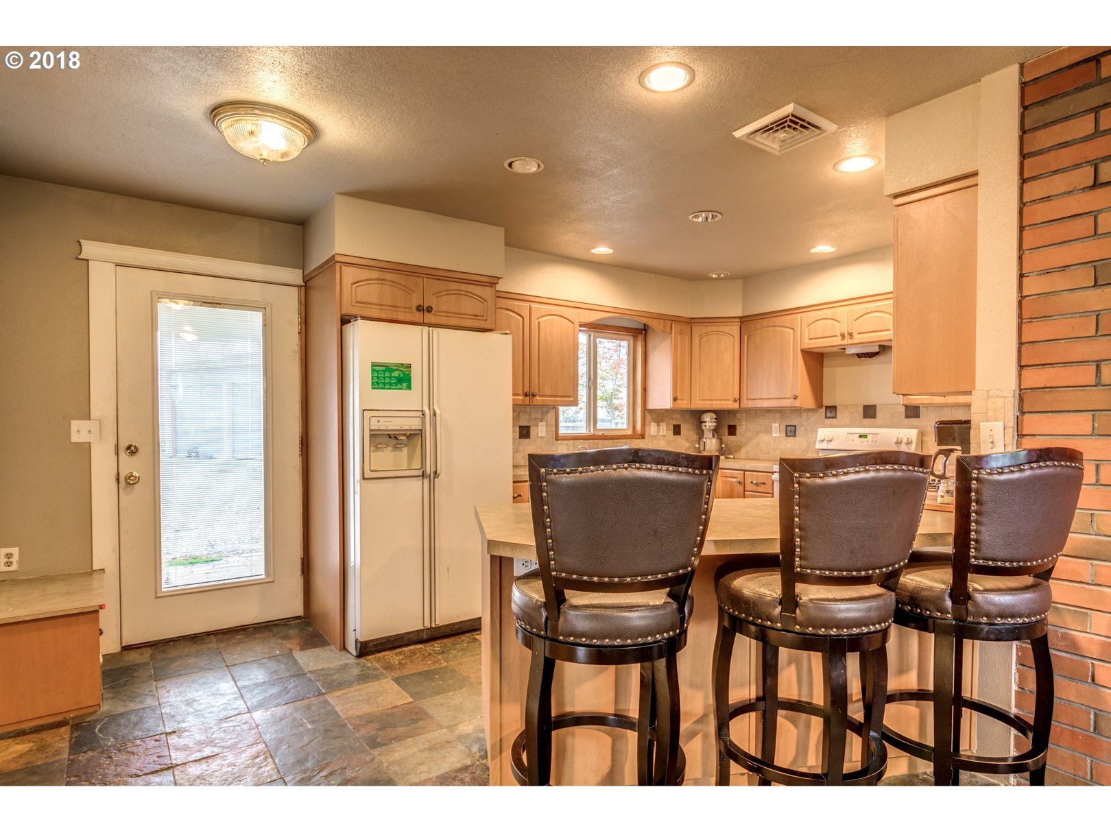 5744 Keene Road Northeast Gervais, OR 97026 - Photo 10 of 32 a view of a dining room with furniture and wooden floor