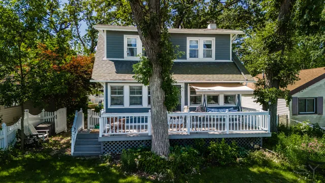 front view of a house with a deck